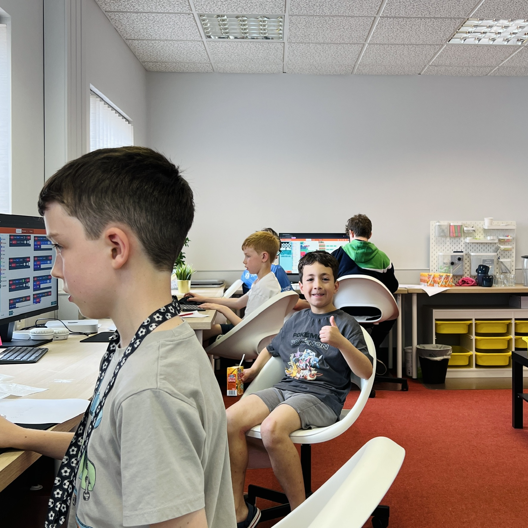 Kids coding together